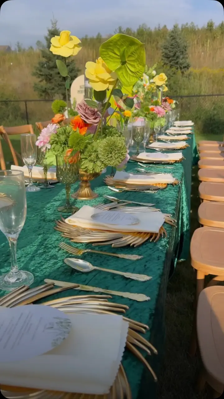 Backyard birthday setup with florals