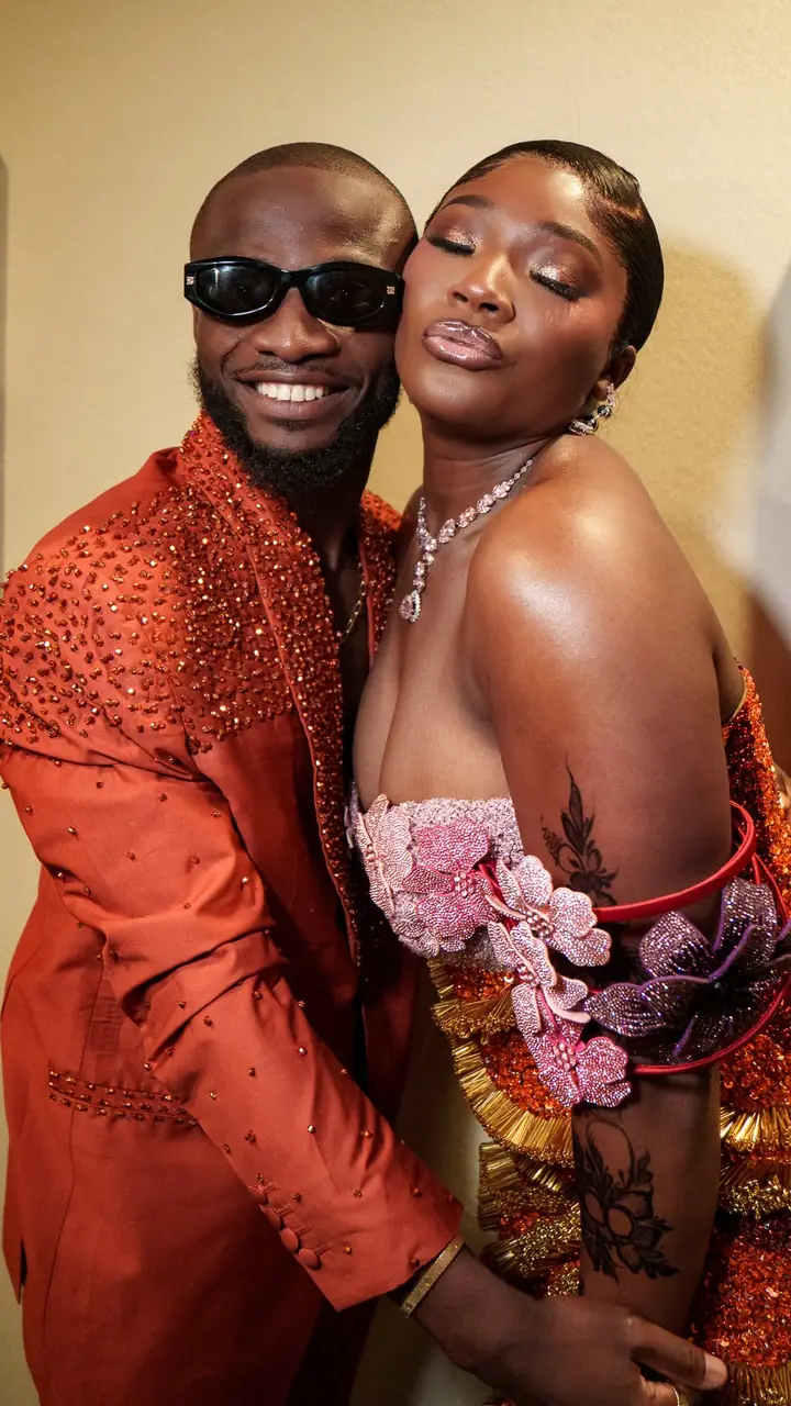 Couple in coordinated Nigerian attire at their wedding